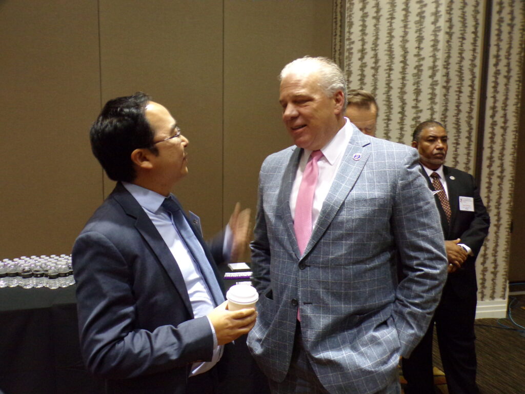 Sweeney, right, and U.S. Rep. Andy Kim (D-3).